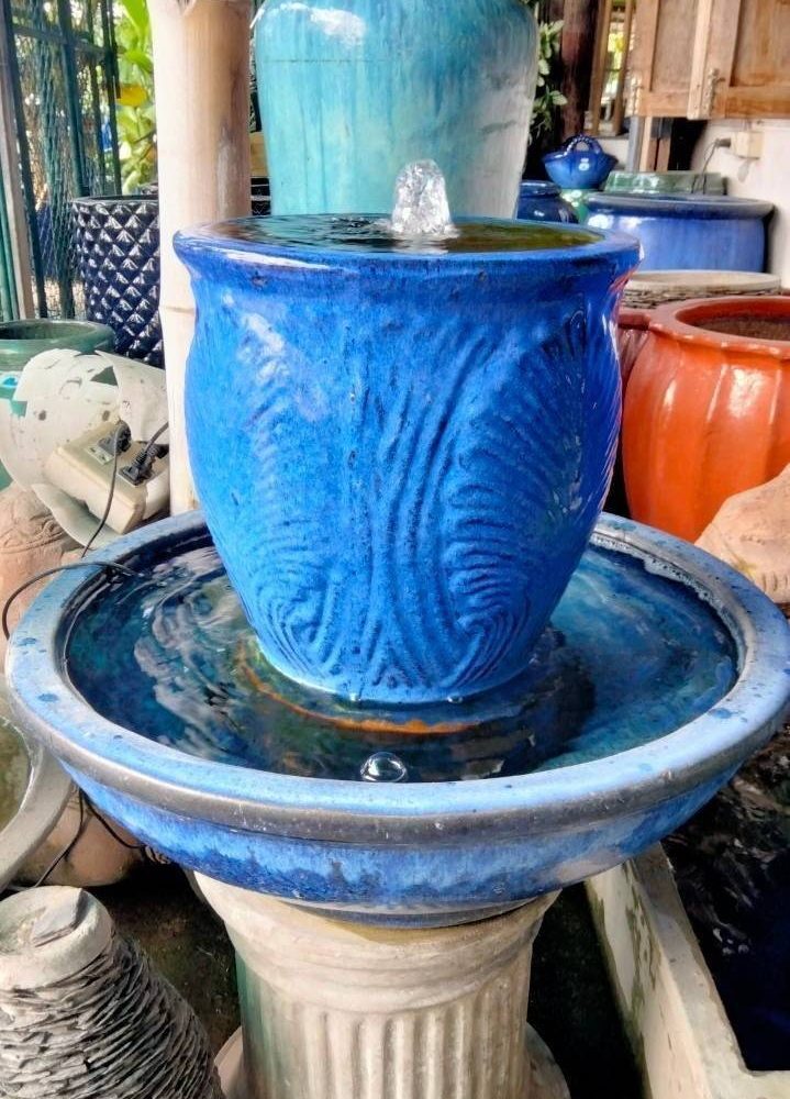 Overflowing water jar, light blue tone, leaf pattern