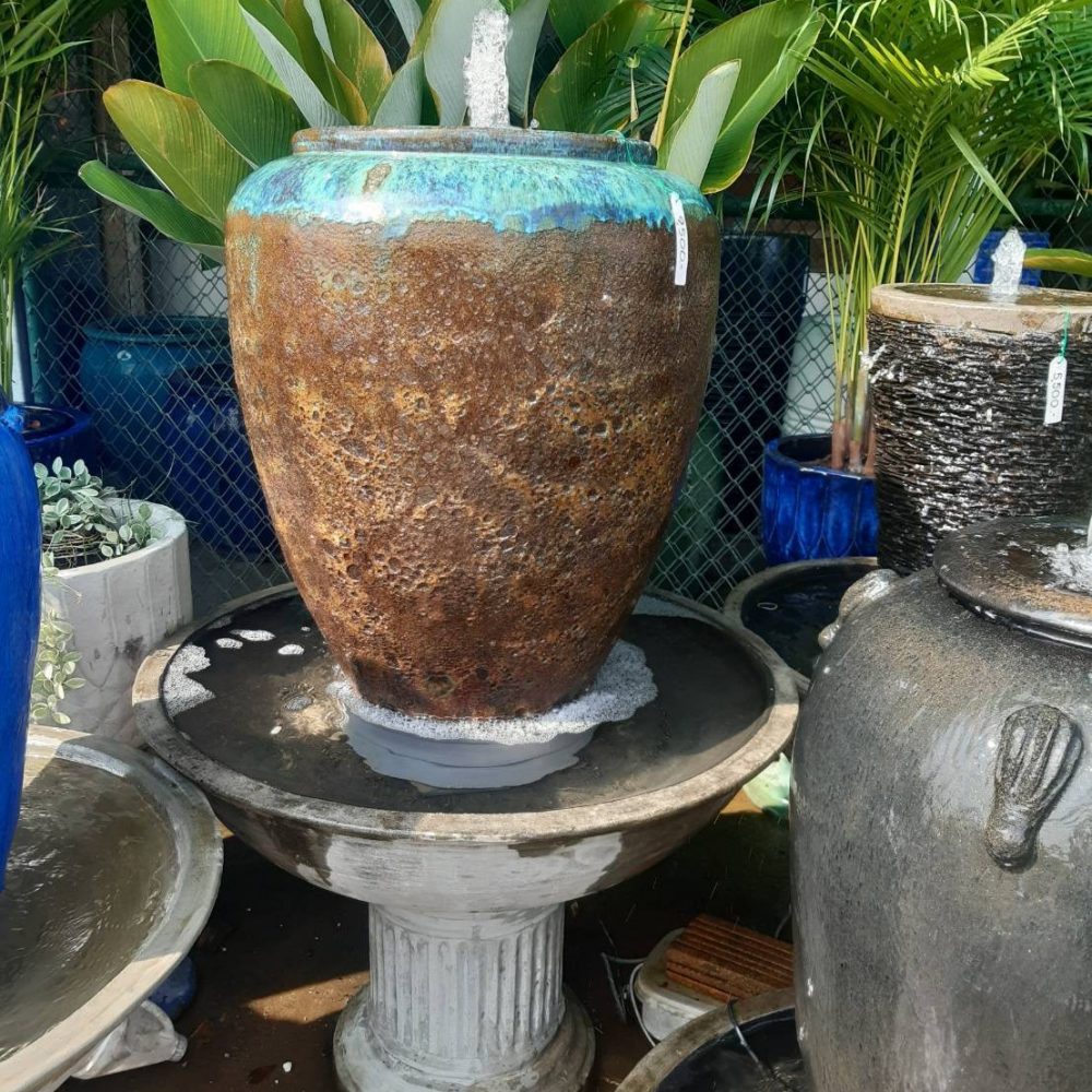 Overflowing water jar rust color