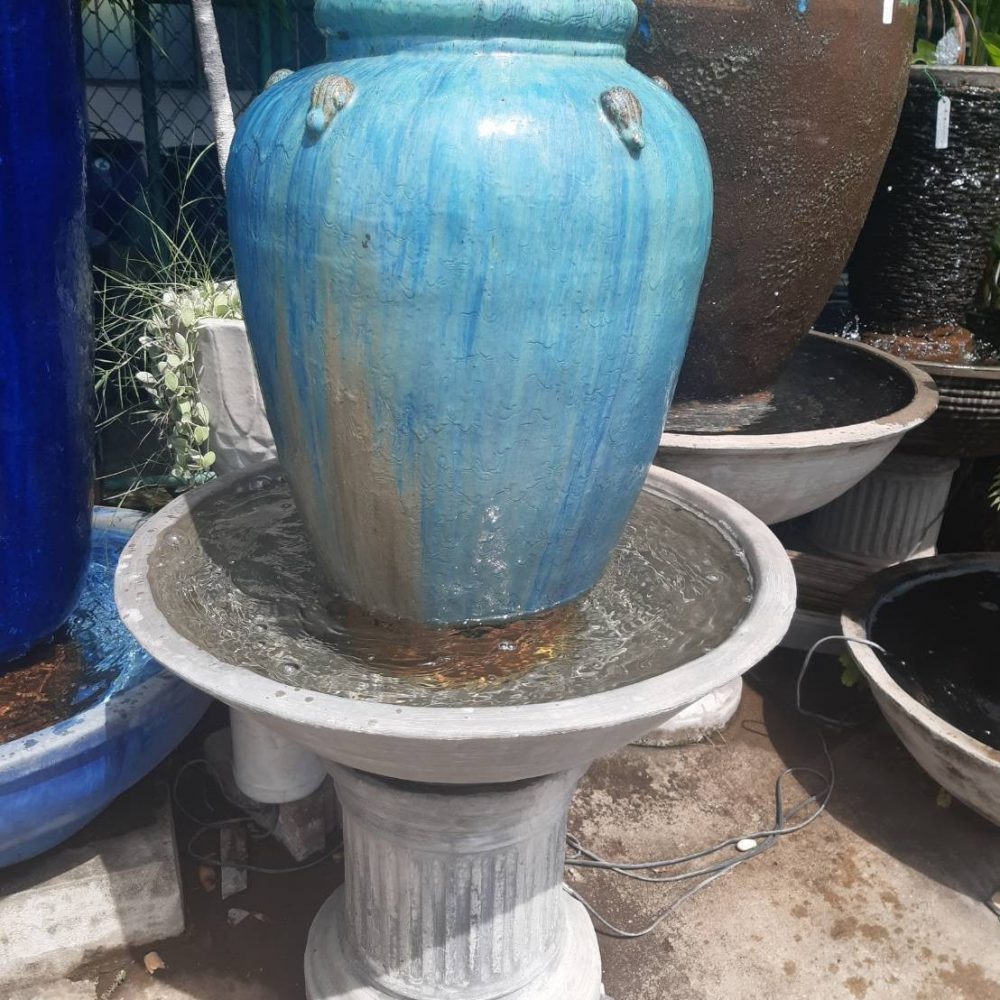 Overflowing water jar smooth blue