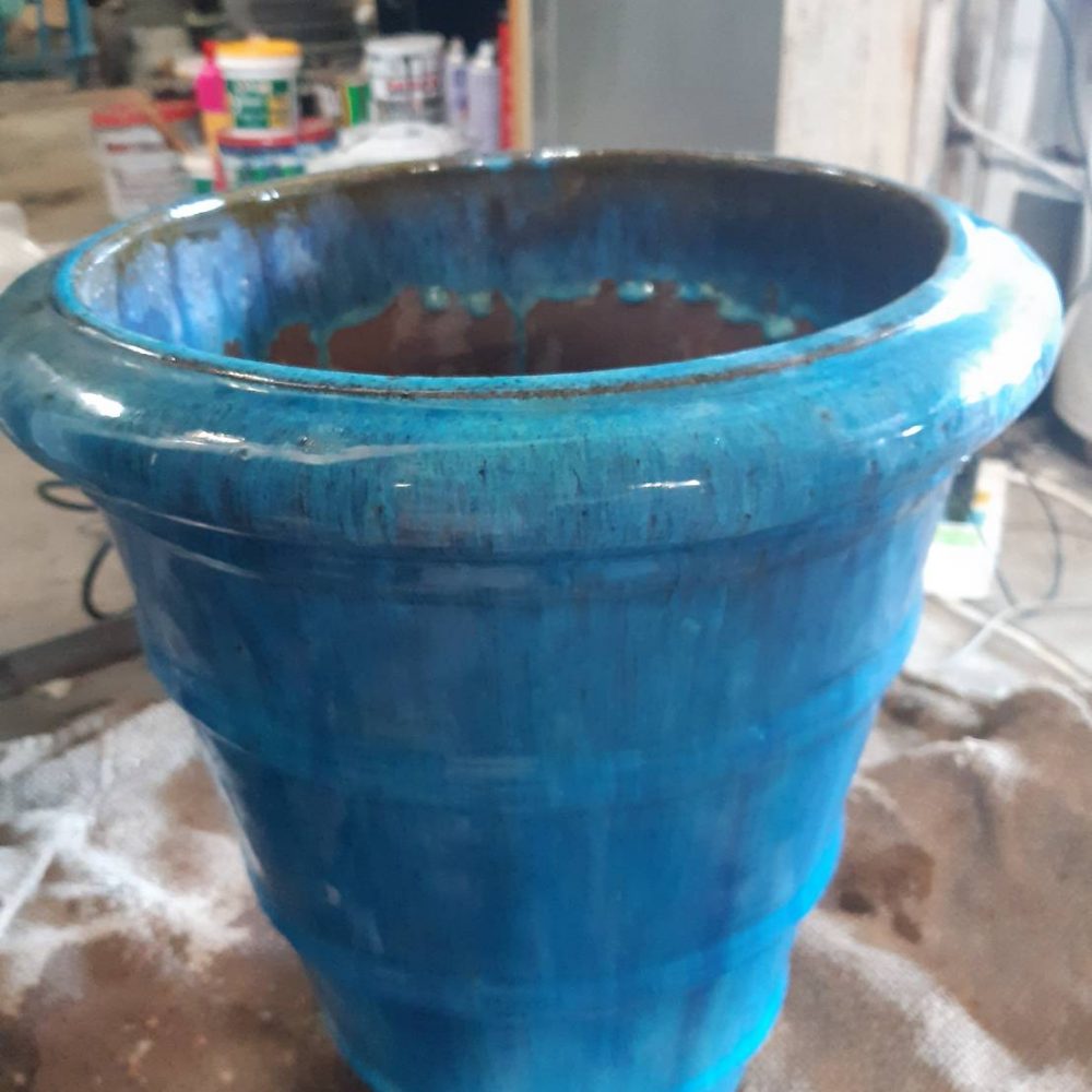Blue ceramic planter with thick edges