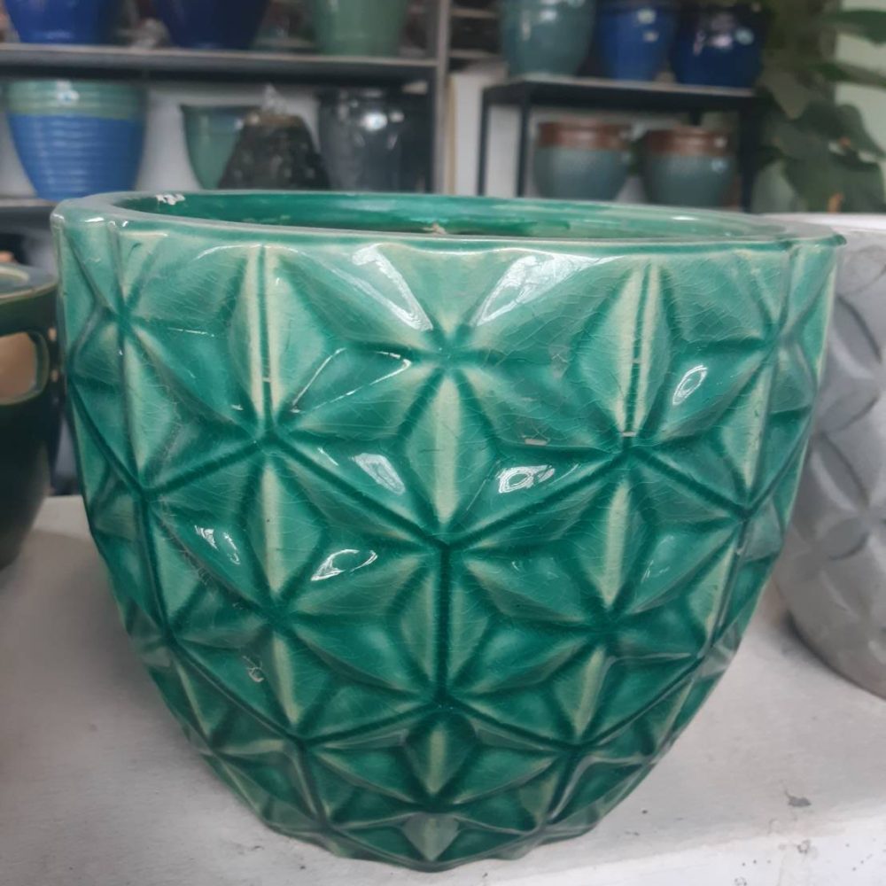 Ceramic planter with starburst pattern